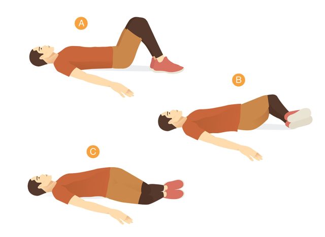 Man doing Lower Trunk Rotation Hip Internal Focus exercise for Rehabilitation and Flexibility. Lying on back and raising knees up for bend and twist into the side.Can help therapy Piriformis syndrome.
