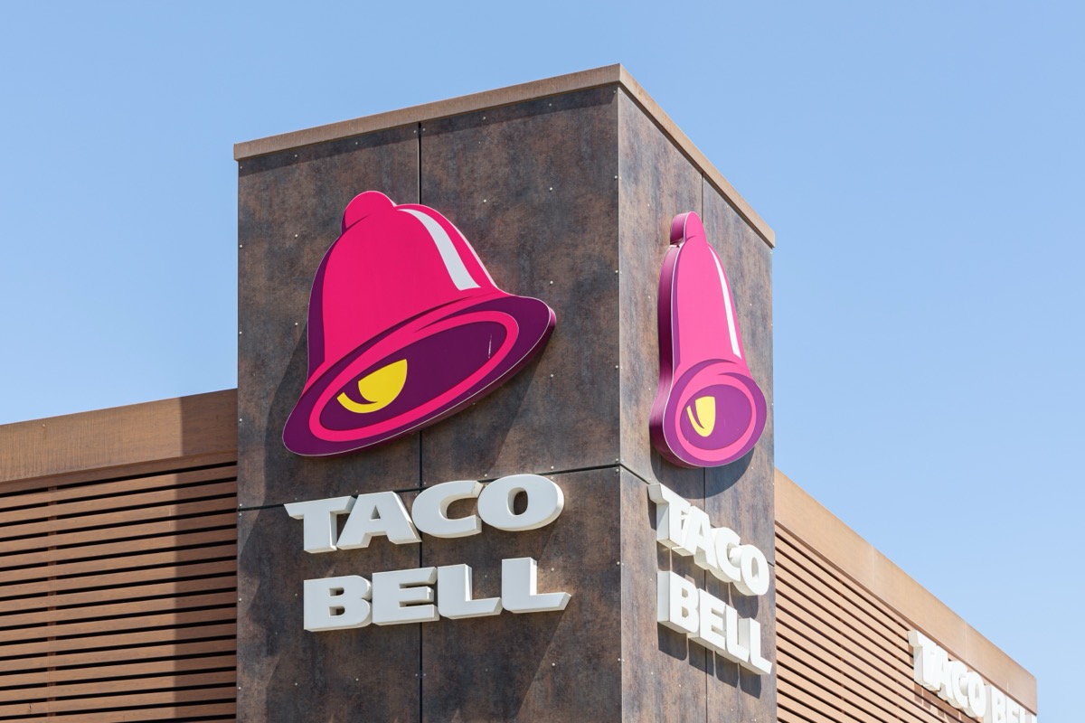 ALFAFAR, SPAIN - JUNE 06, 2022: Taco Bell is an American-based chain of fast food restaurants. The restaurants serve a variety of Mexican-inspired foods