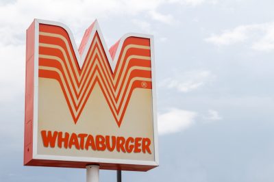 Killeen, TX USA - Jul. 20 2021: A Whataburger restaurant in Texas serves great food and a good time for families of all sizes. This fast food joint is known for their huge burgers and fries.