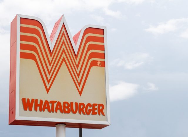 Killeen, TX USA - Jul. 20 2021: A Whataburger restaurant in Texas serves great food and a good time for families of all sizes. This fast food joint is known for their huge burgers and fries.