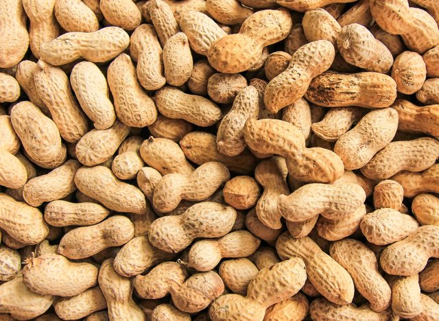 peanut in a shell texture. food background of peanuts