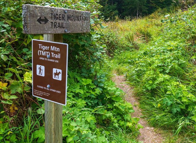 A sign on the trail in the Tiger Mountain State Forest, Washington, USA