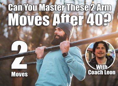 Man is exercising pull -ups in the park. These 2 Exercises Build Arm Strength Faster Than Traditional Workouts After 40. Cover