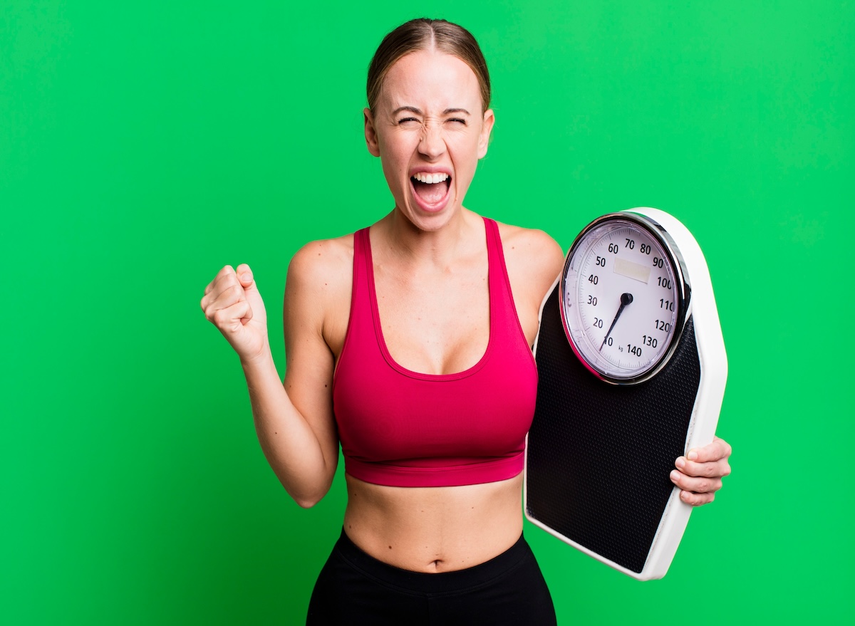 Caucasian,Pretty,Woman,Shouting,Aggressively,With,An,Angry,Expression.,Fitness