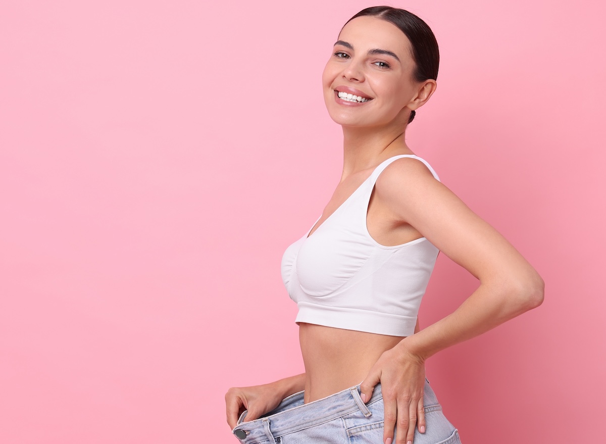 Diet,And,Weight,Loss,Concept.,Happy,Young,Woman,In,Big
