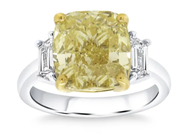 Cushion Cut 7.01 ct Center VS2 Clarity, Fancy Intense Yellow Diamond Platinum Three Stone Ring