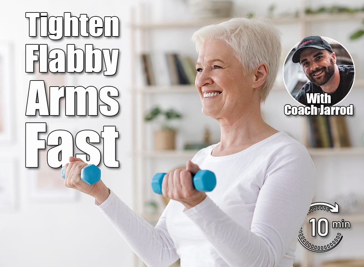 Gym At Home. Positive Aged Woman Training With Dumbbells In Living Room, Copy Space. 4 Simple Arm-Toning Moves That Tighten Flabby Arms in 30 Days After 45. Cover