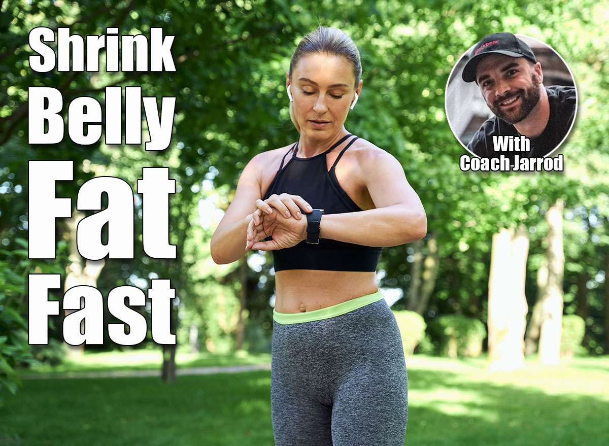 Jog in the morning. Beautiful sporty woman in sportswear and earphones looking at her watch and checking the result while jogging in a green park on a sunny summer day. Here’s How Long Your Walking Workout Should Be to Shrink Belly Fat. Cover