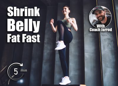 From below of full body slim cheerful female in sportswear doing high knee march step exercise in light spacious gym during workout. The 5-Minute Morning Routine That Shrinks Belly Fat Fast After 50. Cover