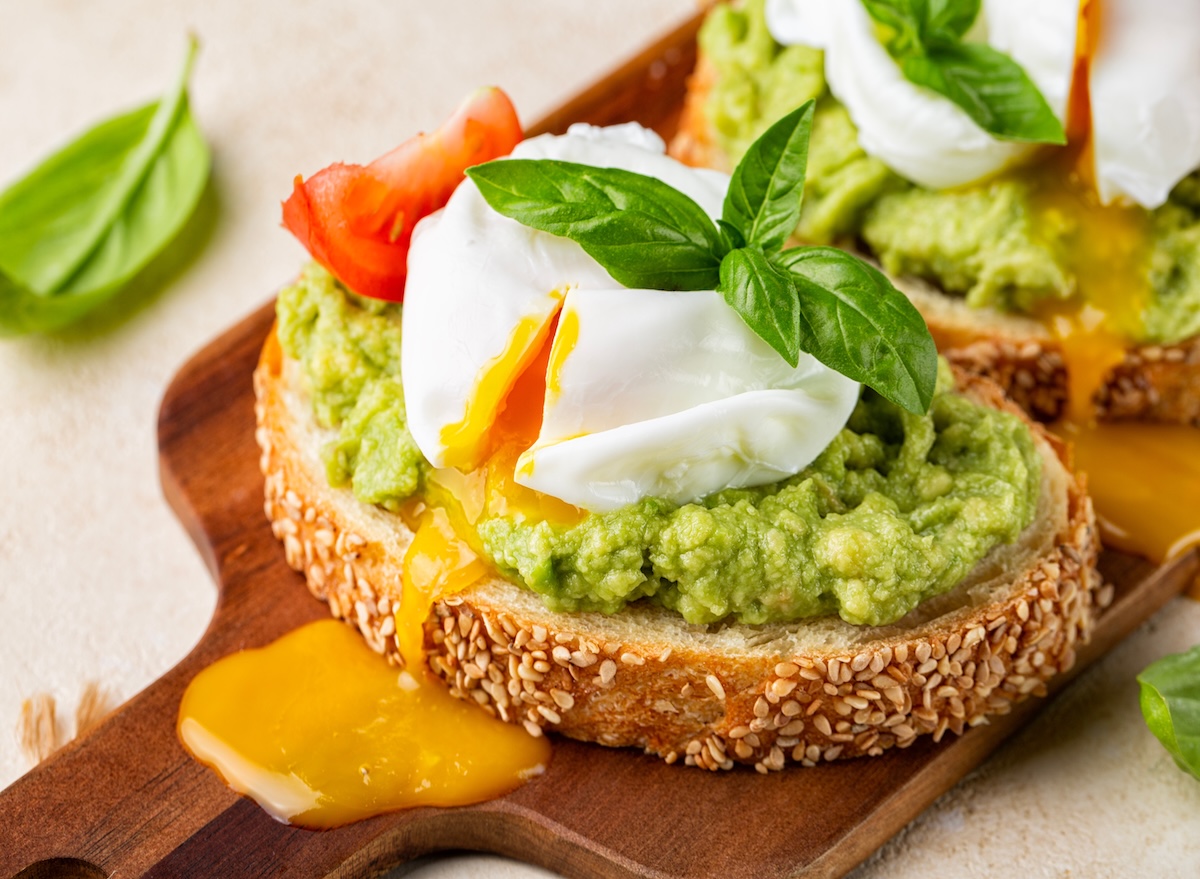 Close up,Of,Smashed,Avocado,Sandwich,With,Boiled,Poached,Egg,With