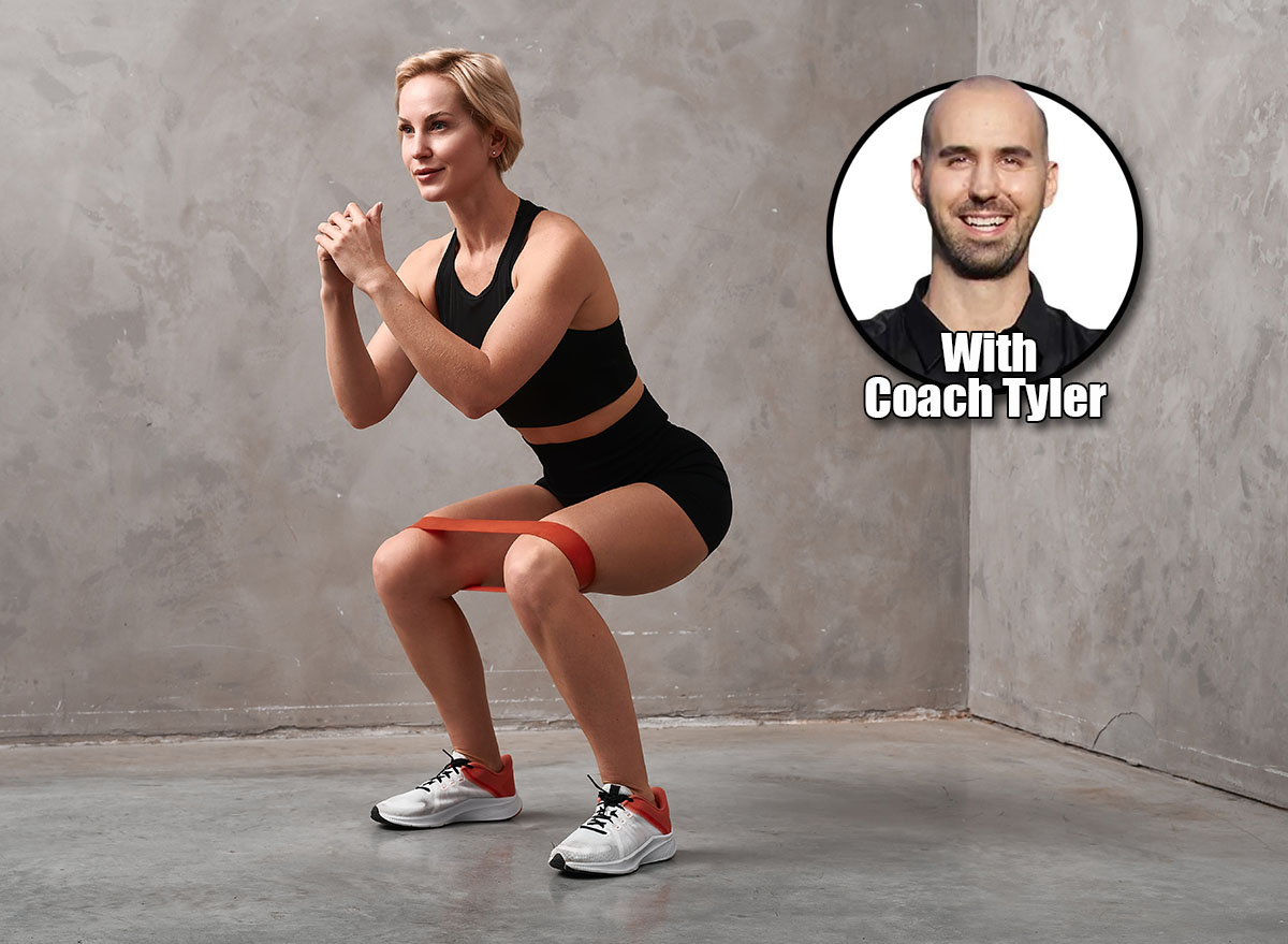 Sportswoman,In,Shape,Is,Doing,Squats,Endurance,With,Resistance,Band.