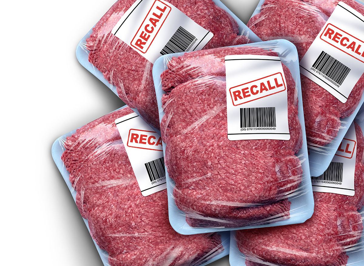 Ground Meat Recall concept as a symbol of contaminated beef or Bacterial outbreak with salmonella or listeria foodborne illness causing food poisoning dangerous bacteria as a public health risk.