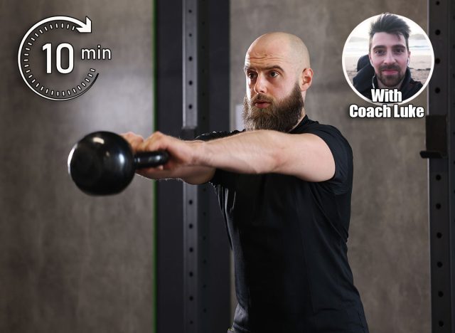 Sportsman doing kettlebell swing during workout in gym. Is 10 Minutes of Exercise Daily Enough to Stay Strong? Cover