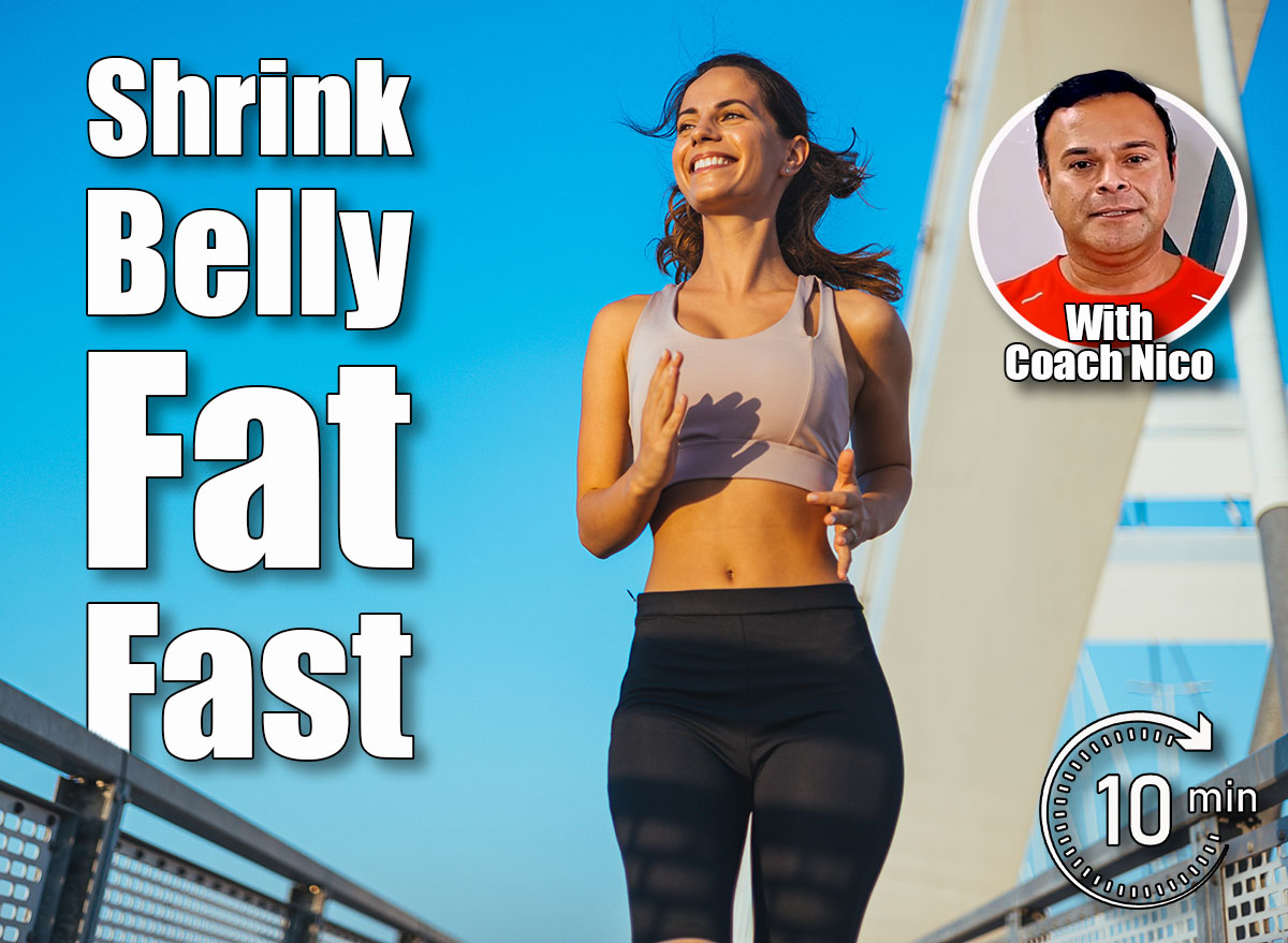 A cheerful woman enjoying her morning jog outdoors while the sun shines brightly. Her activewear and the blue sky background convey fitness, happiness, and health in an urban setting. 5 Walking Moves That Shrink Belly Fat Faster Than the Gym After 45. Cover