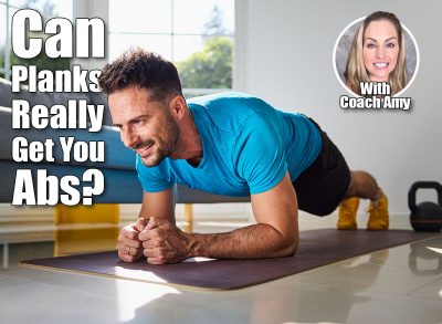 Smiling mid adult man doing plank exercise during home workout. Is Doing Planks Every Day Enough to Get Abs? Cover