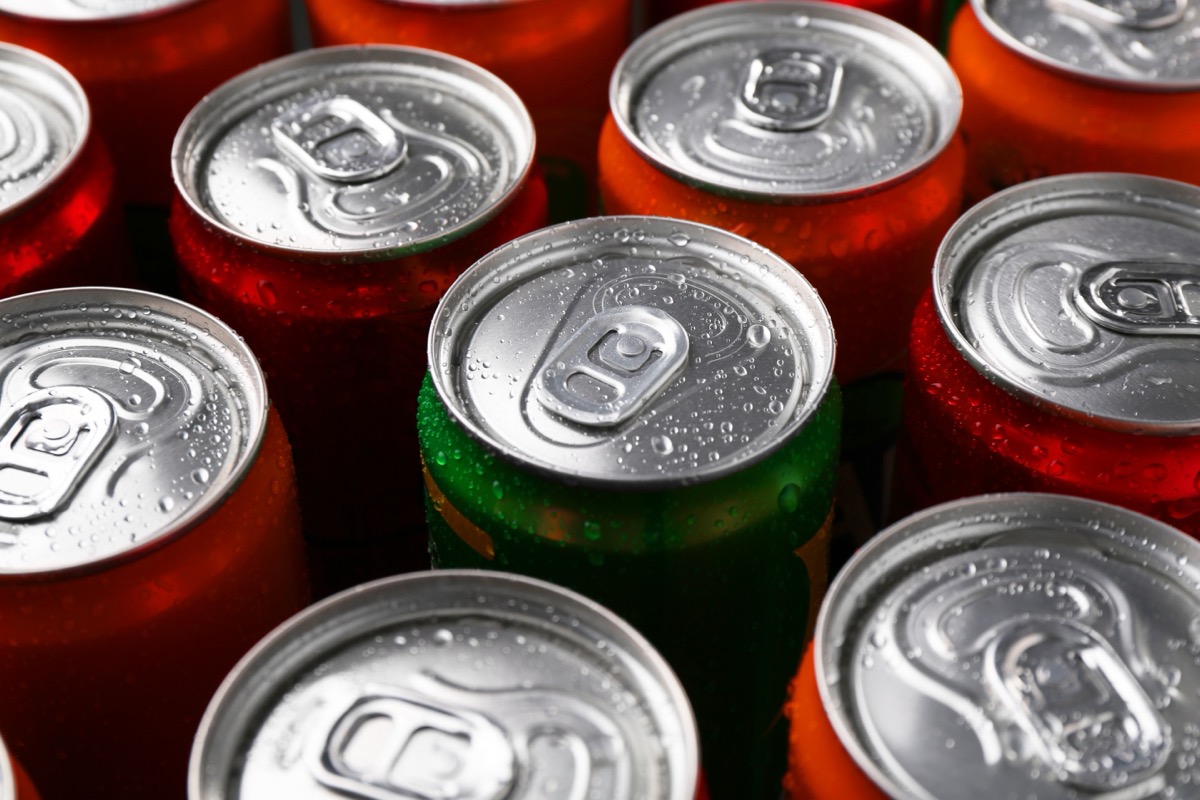 Energy drink in wet cans, closeup. Functional beverage