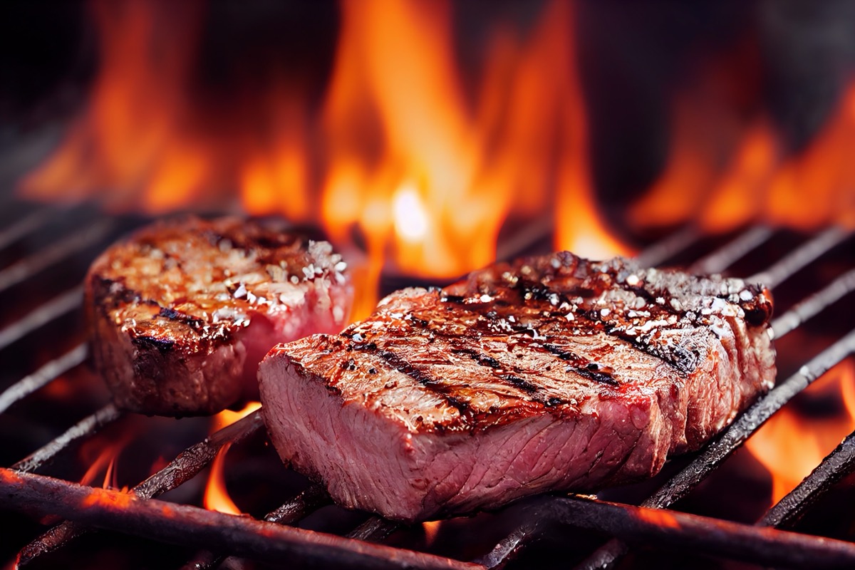 Grilled beef steak medium rare on fire (Selective Focus). 3D Illustration.