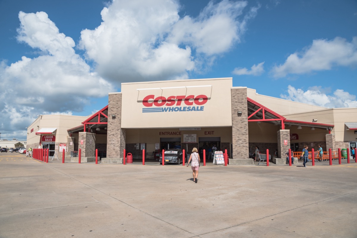 HOUSTON, US - SEP 10, 2016: Costco Wholesale storefront with customers walk in. Costco Wholesale Corporation is largest membership-only warehouse club in US. It has a total of 705 warehouses worldwide