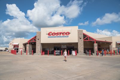 HOUSTON, US - SEP 10, 2016: Costco Wholesale storefront with customers walk in. Costco Wholesale Corporation is largest membership-only warehouse club in US. It has a total of 705 warehouses worldwide