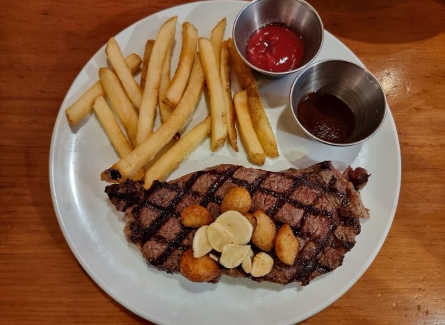 Steak with roasted and fried garlic