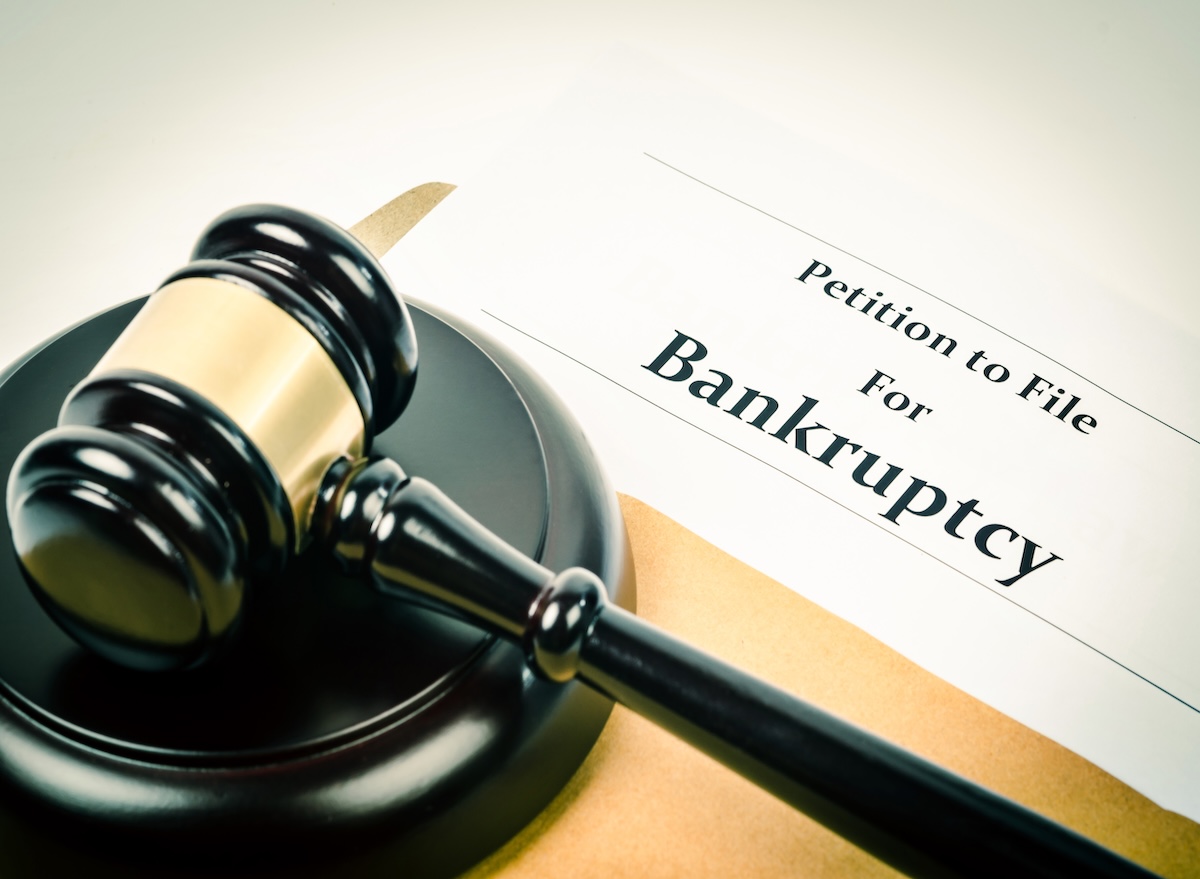 Bankruptcy,Document,With,Wooden,Gavel,,Buseniss,Concept.