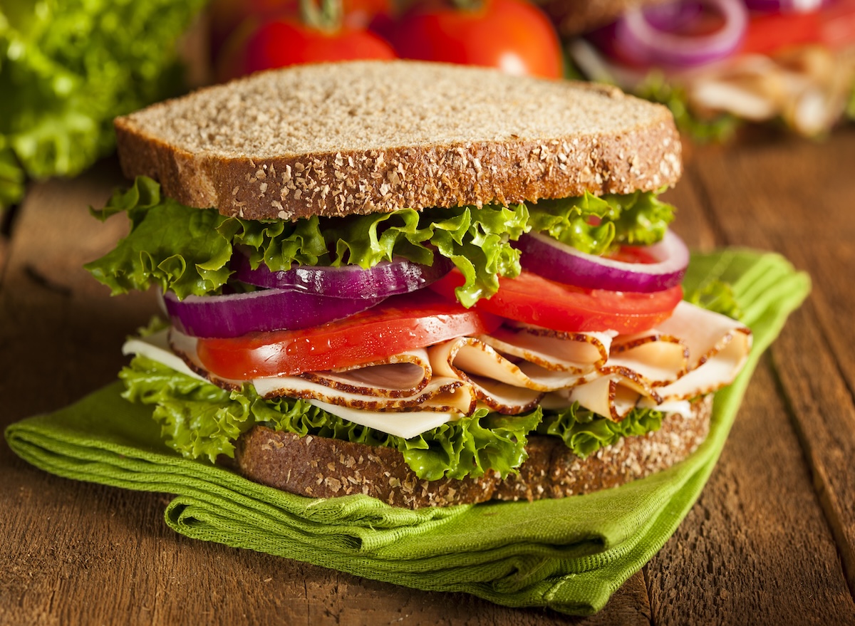 Homemade,Turkey,Sandwich,With,Lettuce,,Tomato,,And,Onion