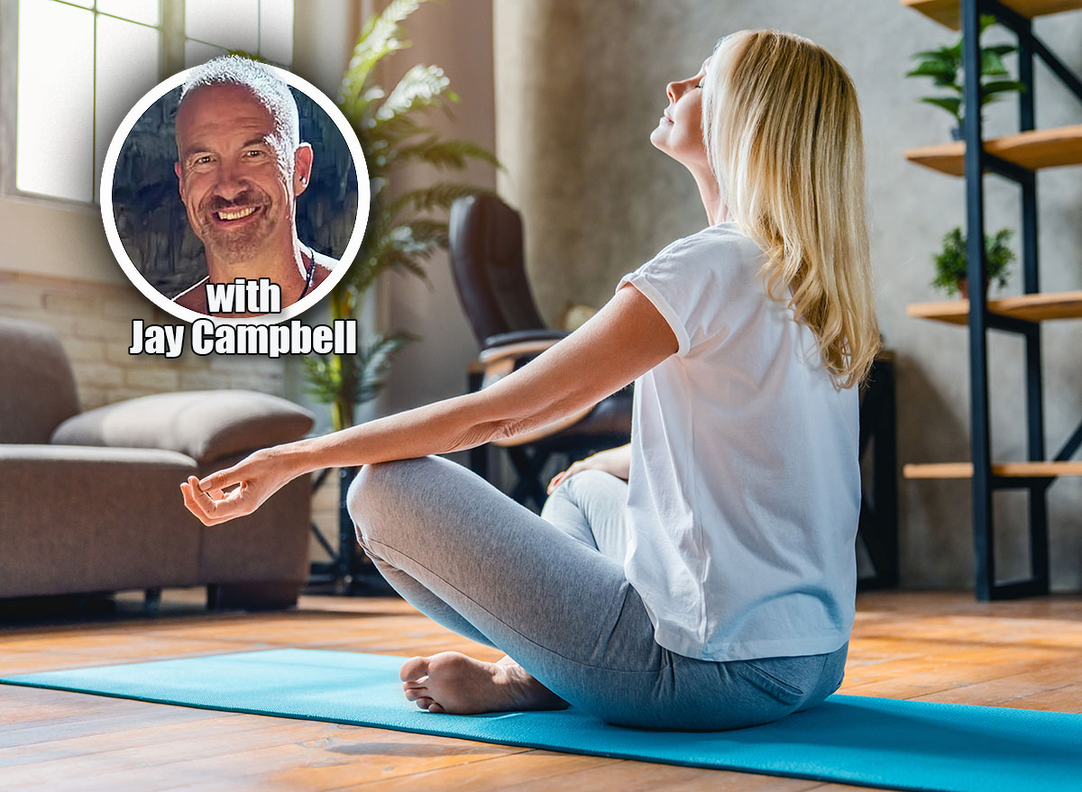 Middle aged woman meditating in lotus position, aged female practice yoga at home. Why Everyone Over 45 Is Secretly Using 'Peptide Stacking' to Rebuild Lost Muscle. Cover