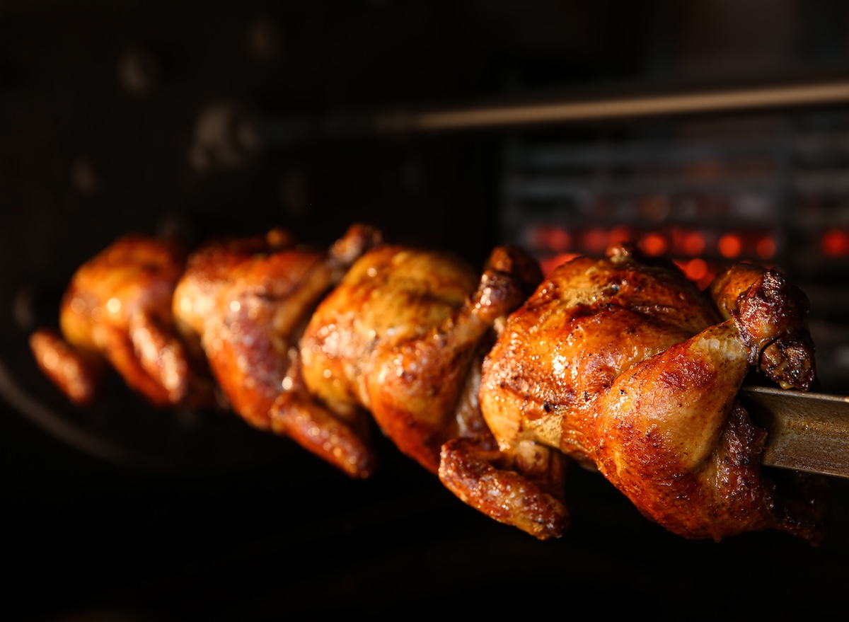 Grilling,Whole,Chickens,In,Rotisserie,Machine,,Closeup