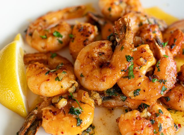 Pan fried butter garlic shrimp on plate