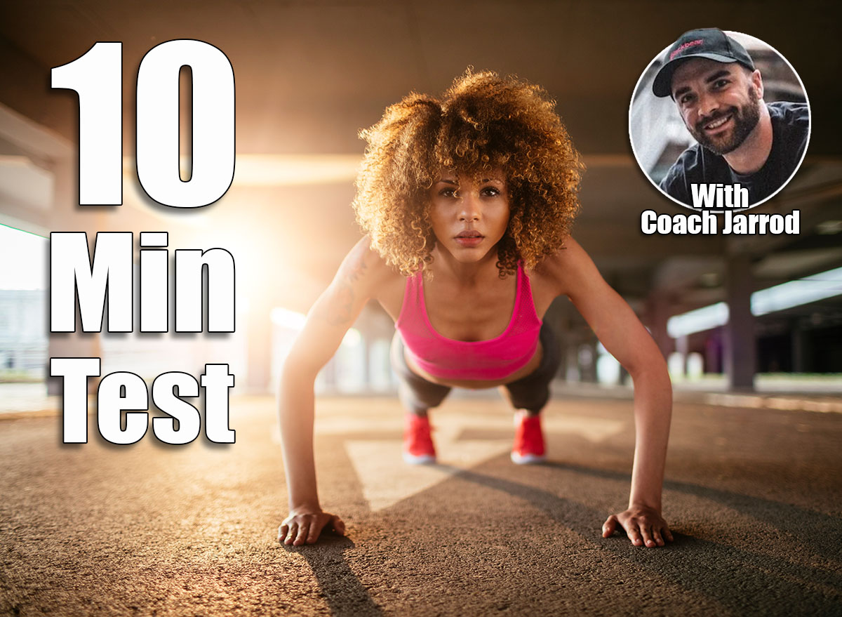 Young woman doing push ups and exercising in a parking lot. If You Can Do This Many Push-Ups at 45, Your Upper Body Is Elite. Cover