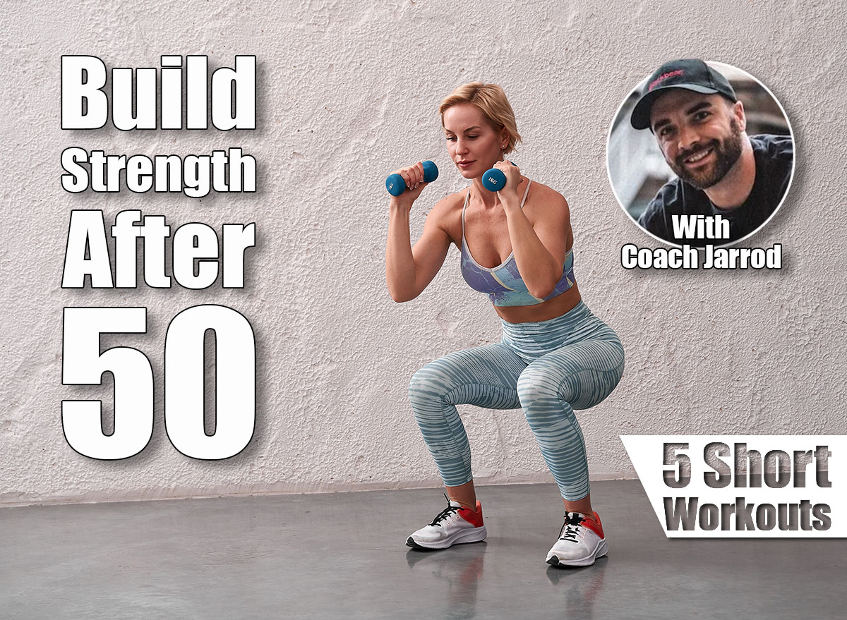 Female trainer performs a squat with dumbbells in hands, arms bent at the elbows and pressed to the chest. Beautiful sporty woman doing power fitness exercise at sport gym. 5 Short Workouts That Keep You Stronger Than Most 30-Year-Olds After 50. Cover