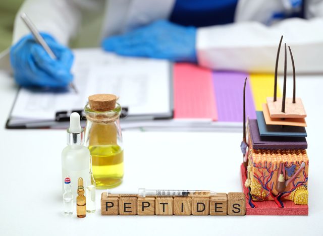 A detailed lab scene featuring various peptides, research materials, and advanced analysis tools for scientific study