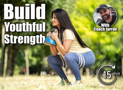 Beautiful mature woman doing kettlebell squat in park on sunny morning. 5 Standing Exercises That Reverse Aging Better Than Cardio After 40. Cover