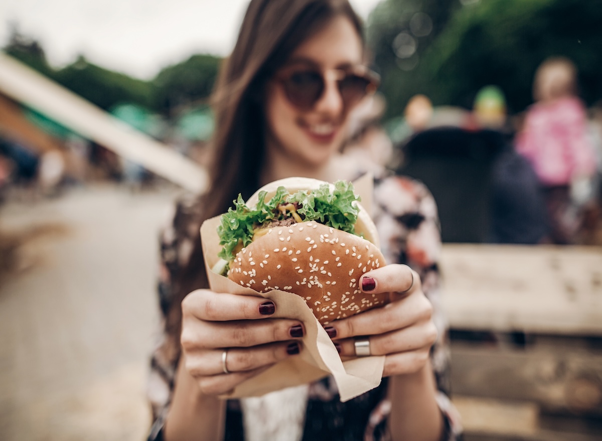 Tasty,Burger.,Stylish,Hipster,Woman,Holding,Juicy,Hamburger,In,Hands