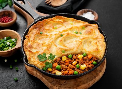 Shepherd's pie, traditional British dish with minced meat, vegetables and mashed potatoes.