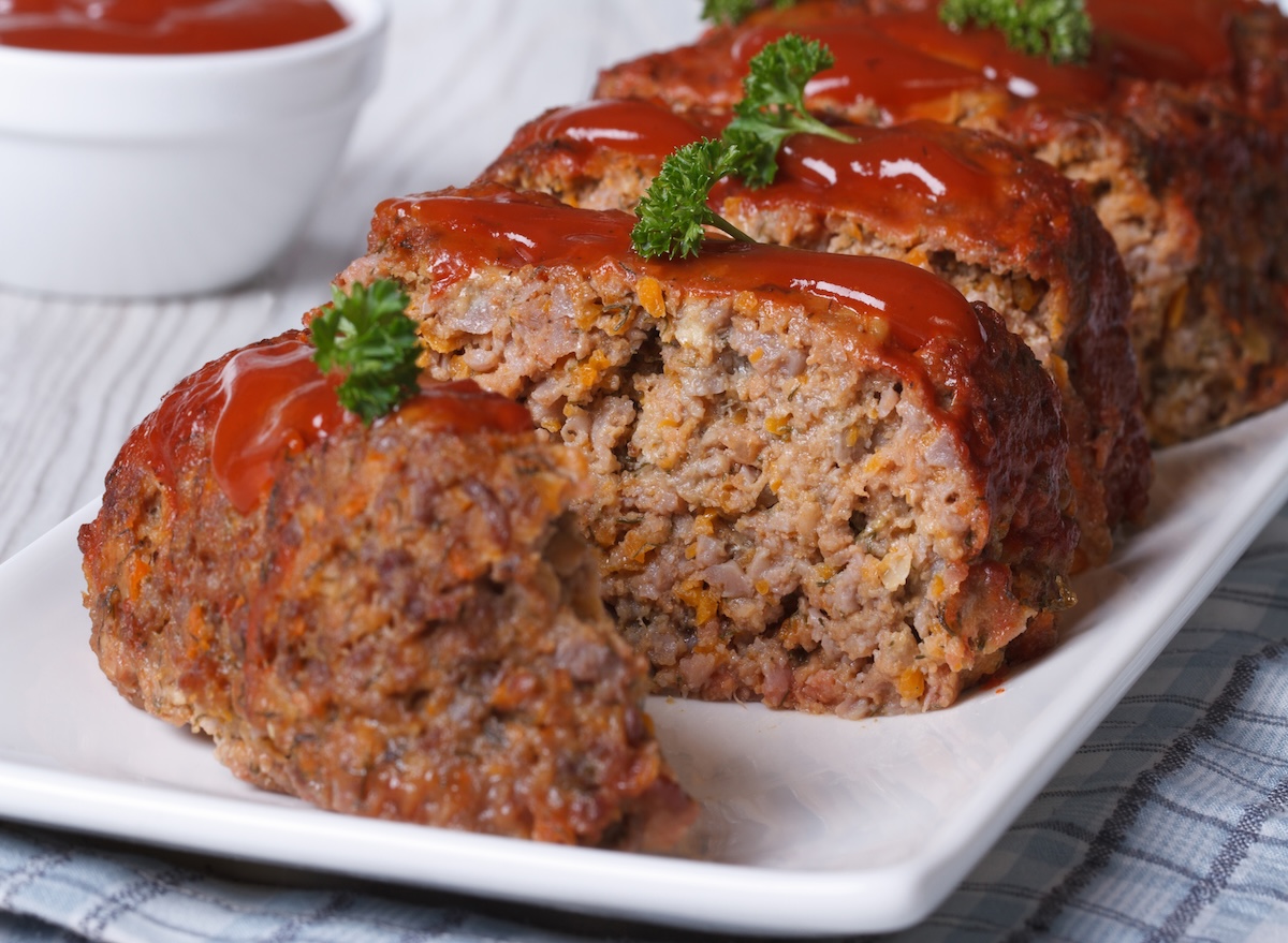 Sliced,Meatloaf,With,Ketchup,And,Parsley,Closeup,On,A,White