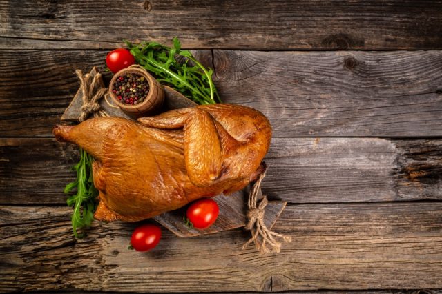 Smoked whole Chicken with a Golden. Rustic style. Turkish cuisine.