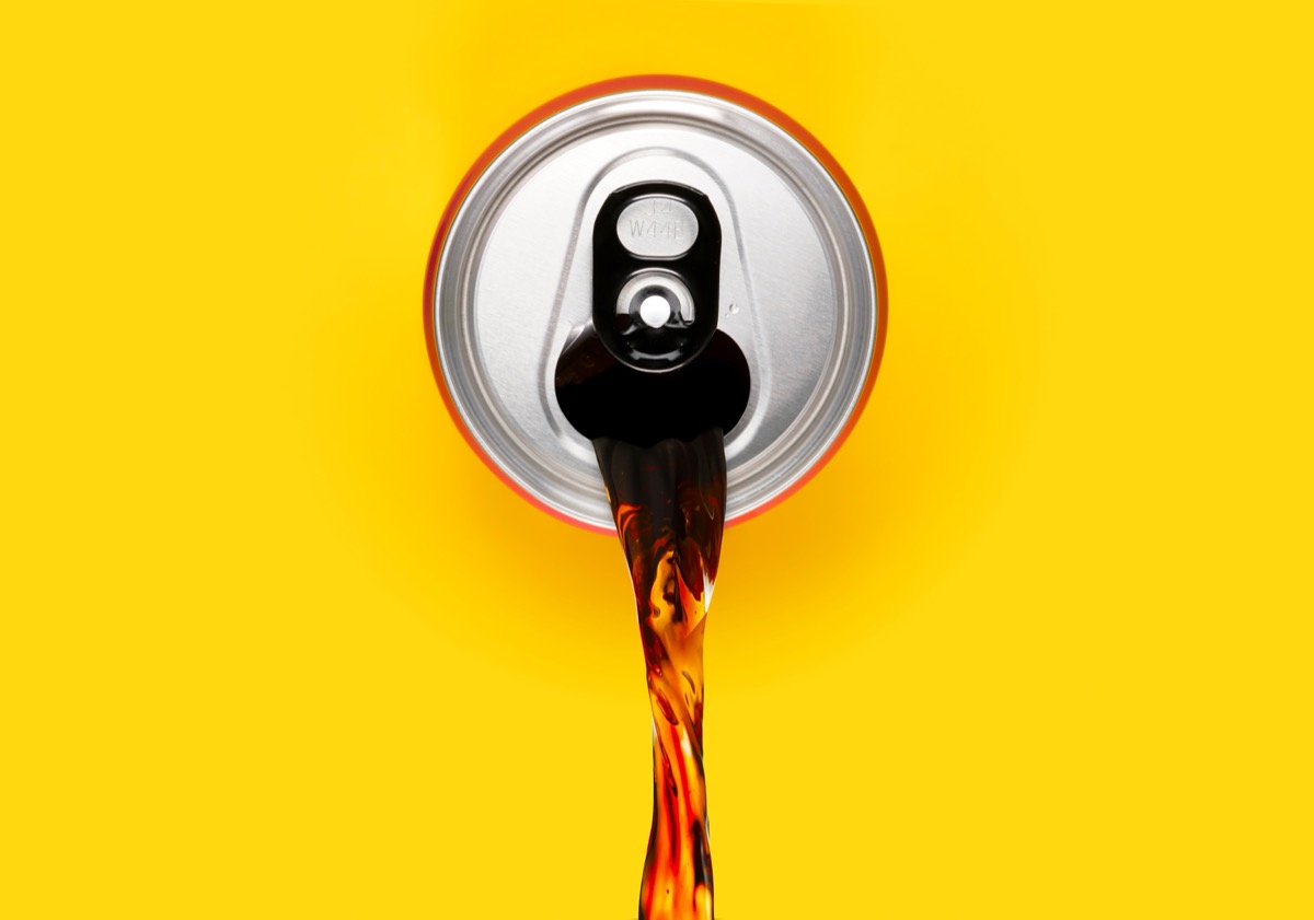 Cola,Soda,Can,Pouring,Out.,Spilling,Energy,Or,Soft,Drink