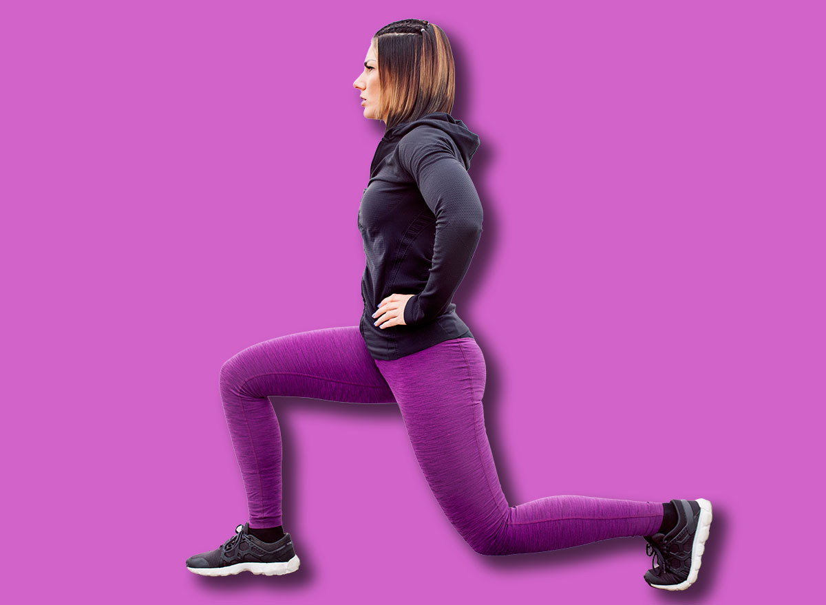 Fitness woman split squat exercise outdoor