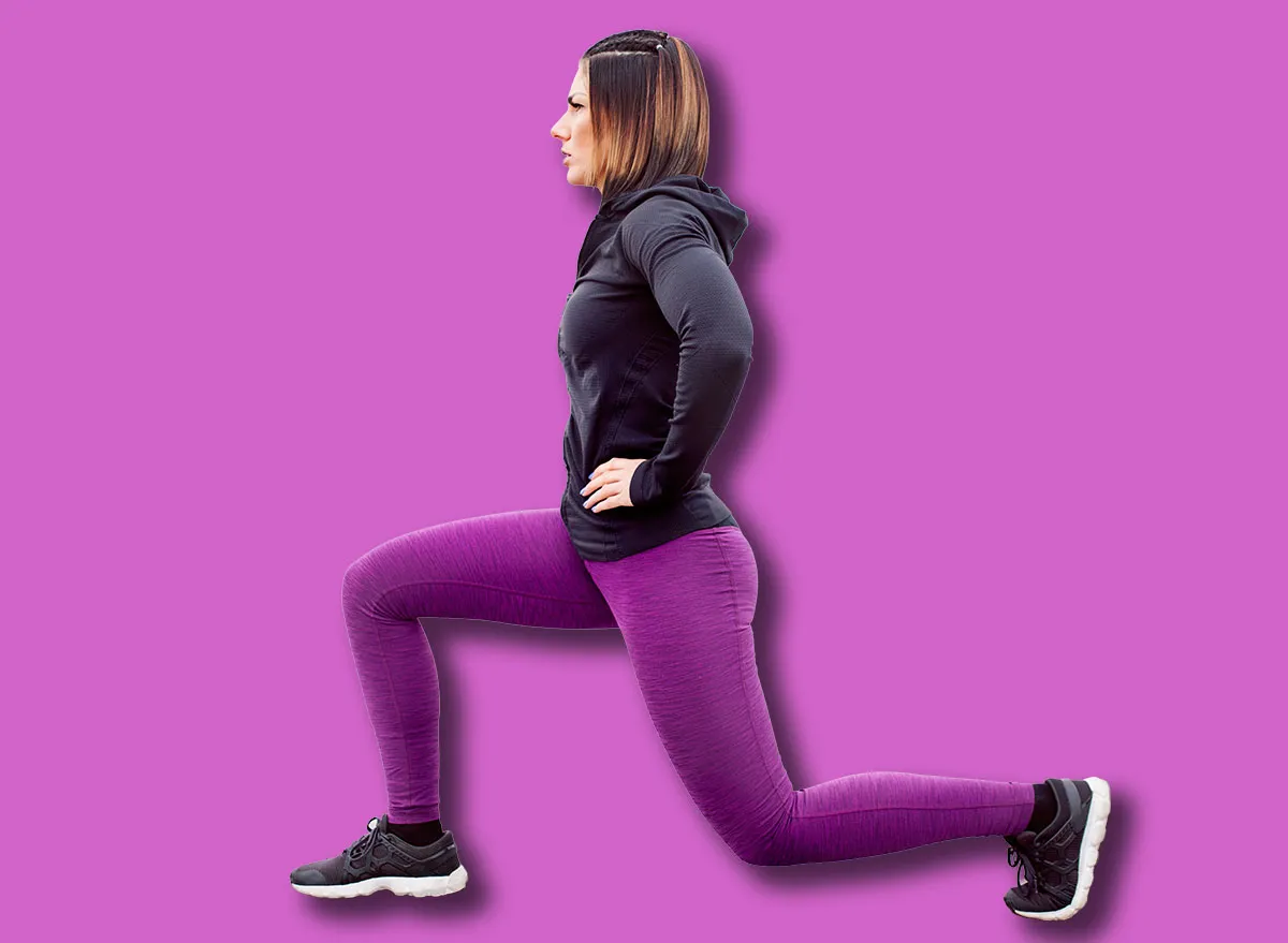 Fitness woman split squat exercise outdoor