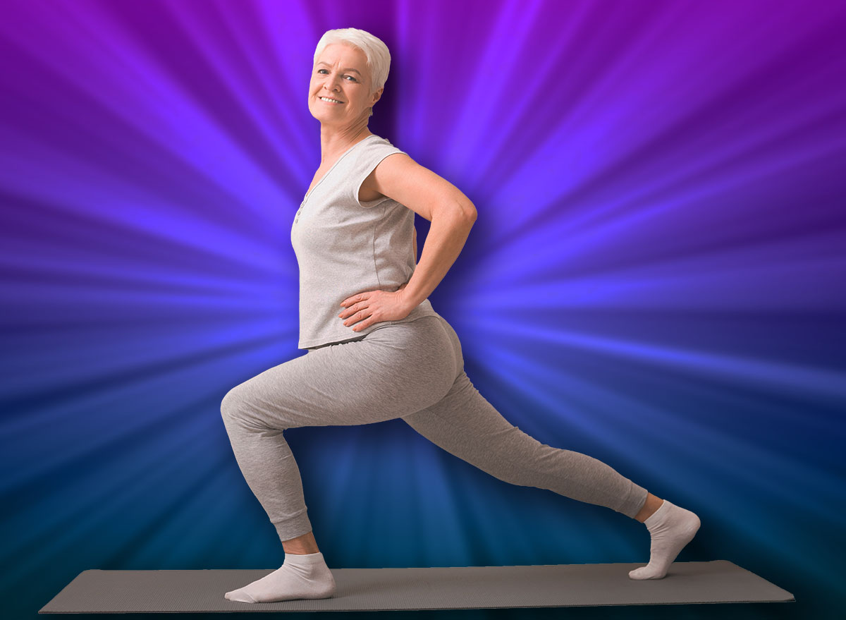 Legs stretching. Sporty senior lady doing lunges at home, empty space