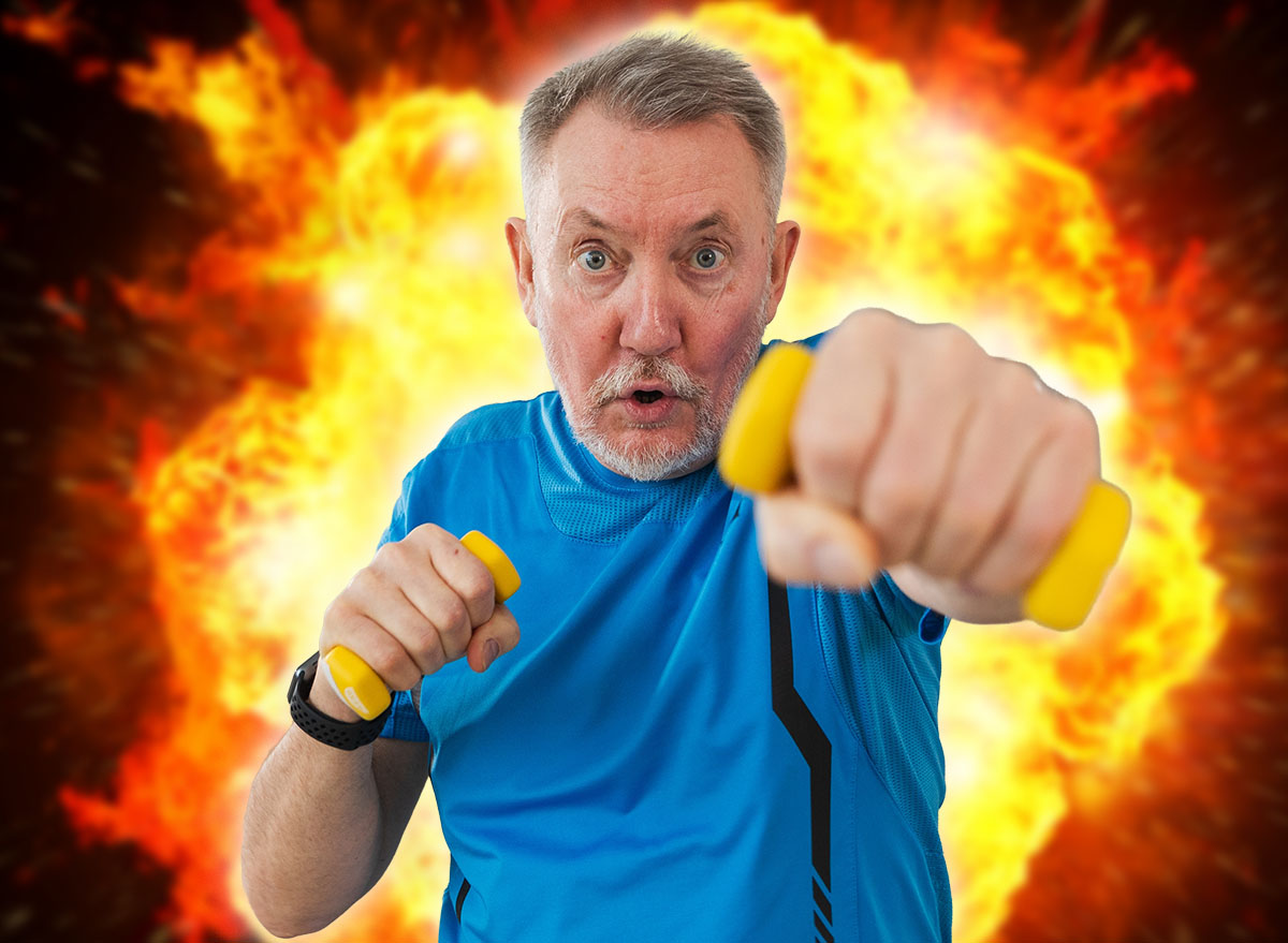 Fitness workout training. Senior man boxing punching picking up dumbbells. Old adult mature healthy man doing sports exercise at home. Grandfather have workout rehabilitation. Health care healthy