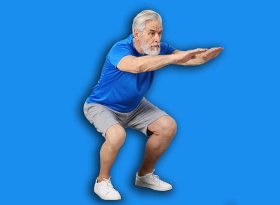 Elderly man exercising at home. Healthy leisure