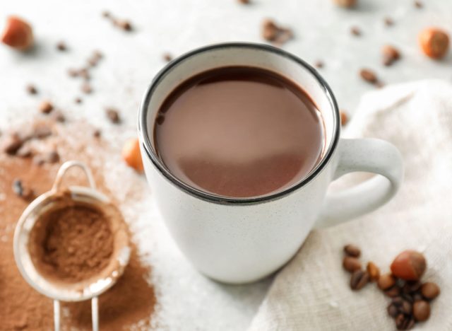 Cup of hot chocolate on light table