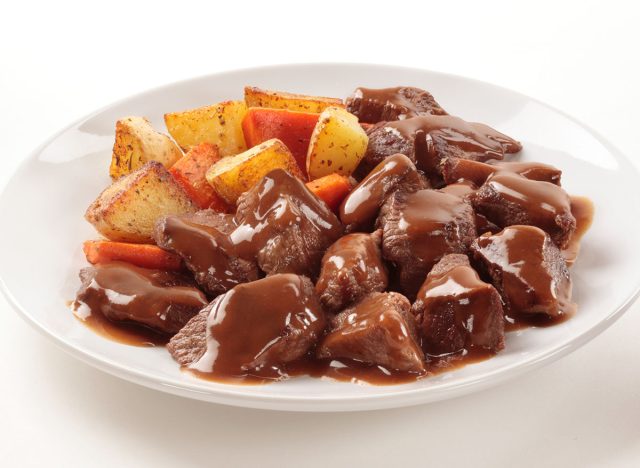 Beef tips with gravy, potatoes and carrots.