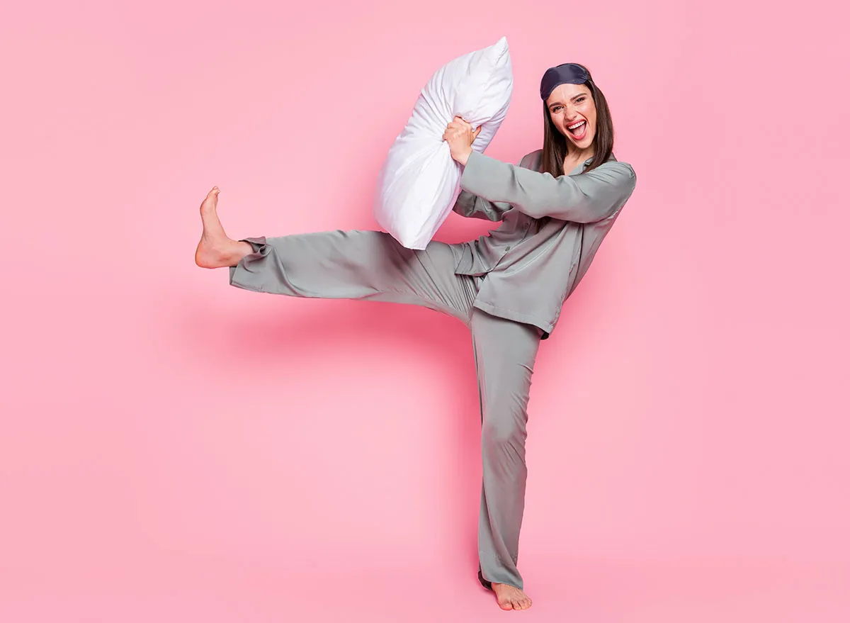 Photo,Of,Sweet,Charming,Young,Woman,Nightwear,Smiling,Pillow,Fighting