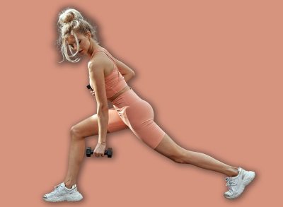 Fitness woman doing exercise outdoor with dumbbells. Young sexy sporty girl doing one arm row.