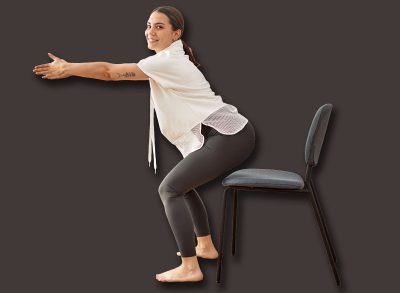 Young hispanic woman smiling confident stretching at sport center.