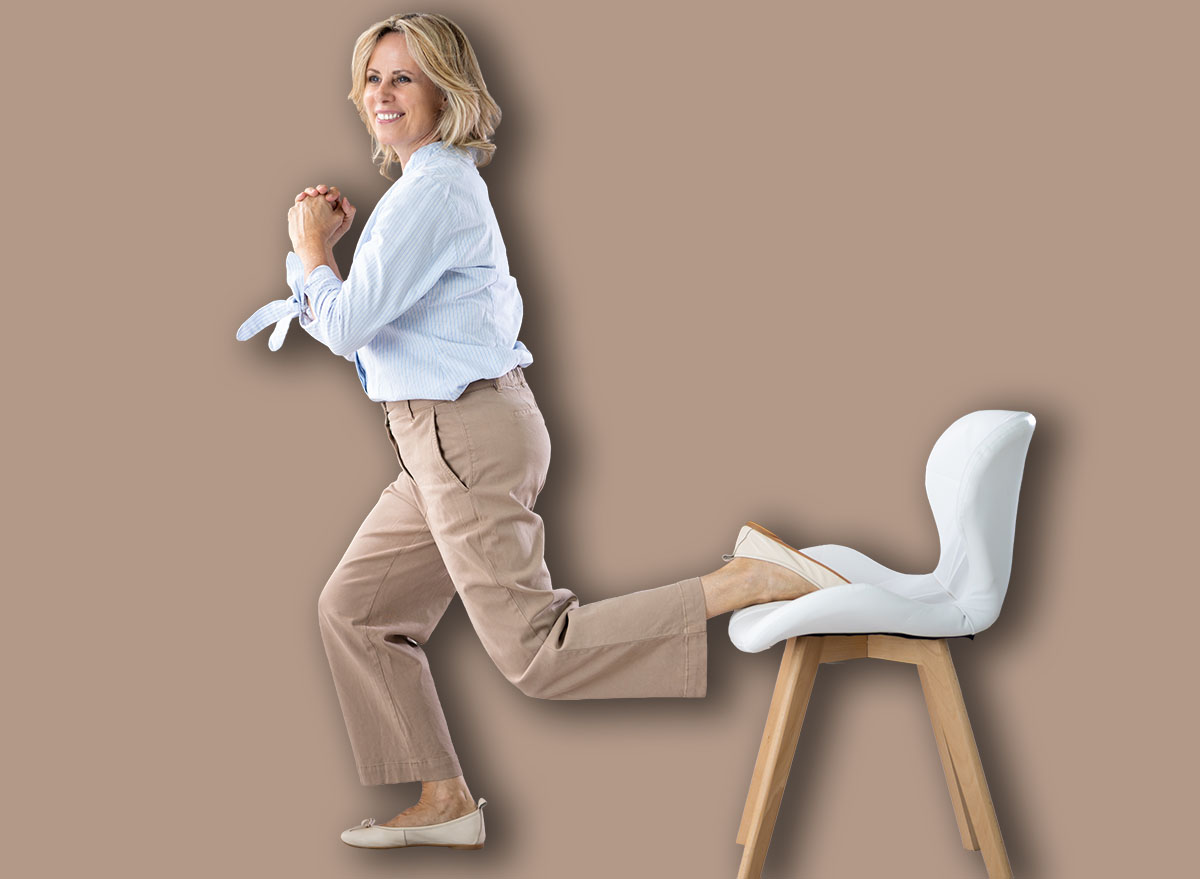 Squat Employee Doing Bulgarian Split Squat Exercise In Office