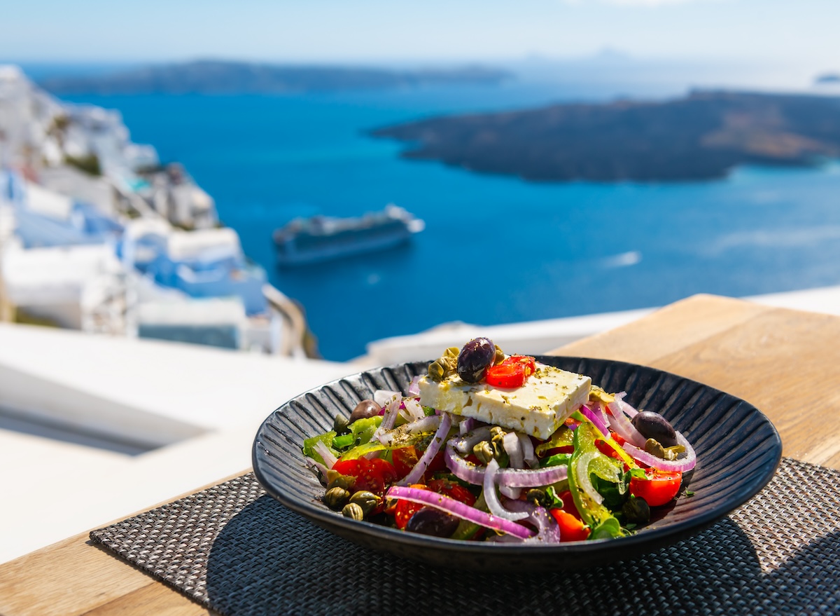 Greek,Salad,With,Beautiful,Sea,View,In,Santorini,Island,,Greece.